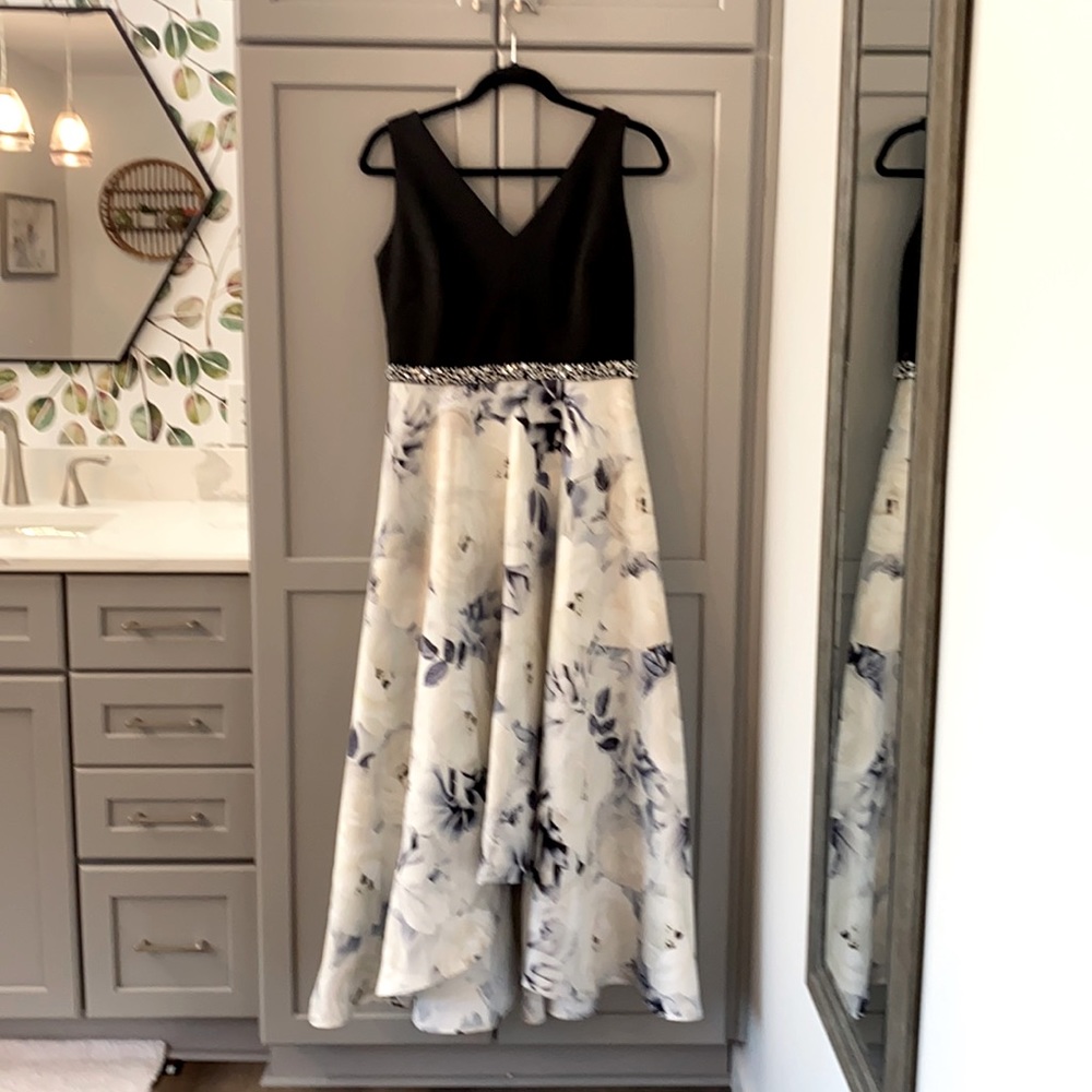 Beautiful black and floral formal gown only worn once size 8.